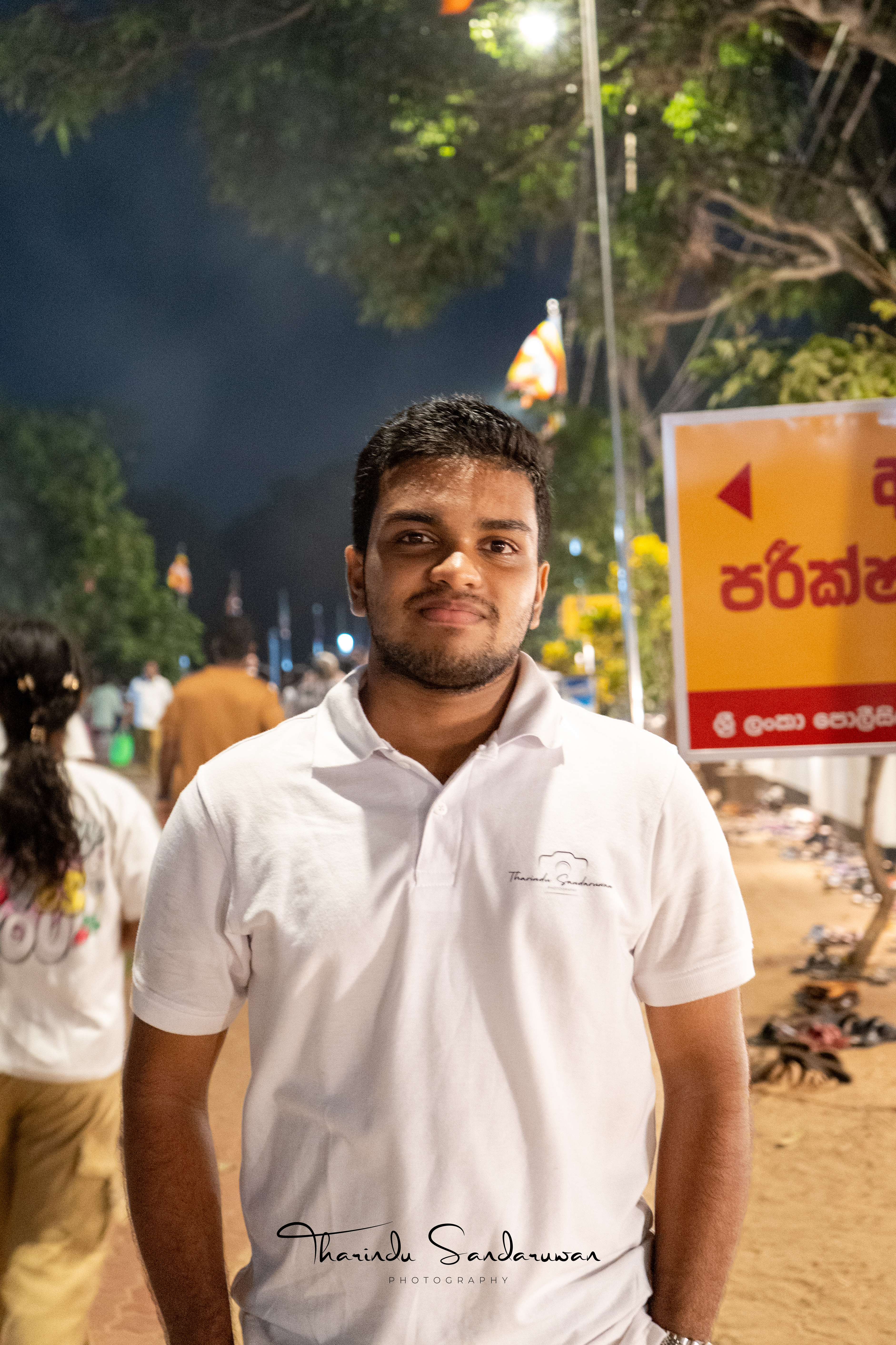 Tharindu Sandaruwan outdoors at night in Anuradhapura.